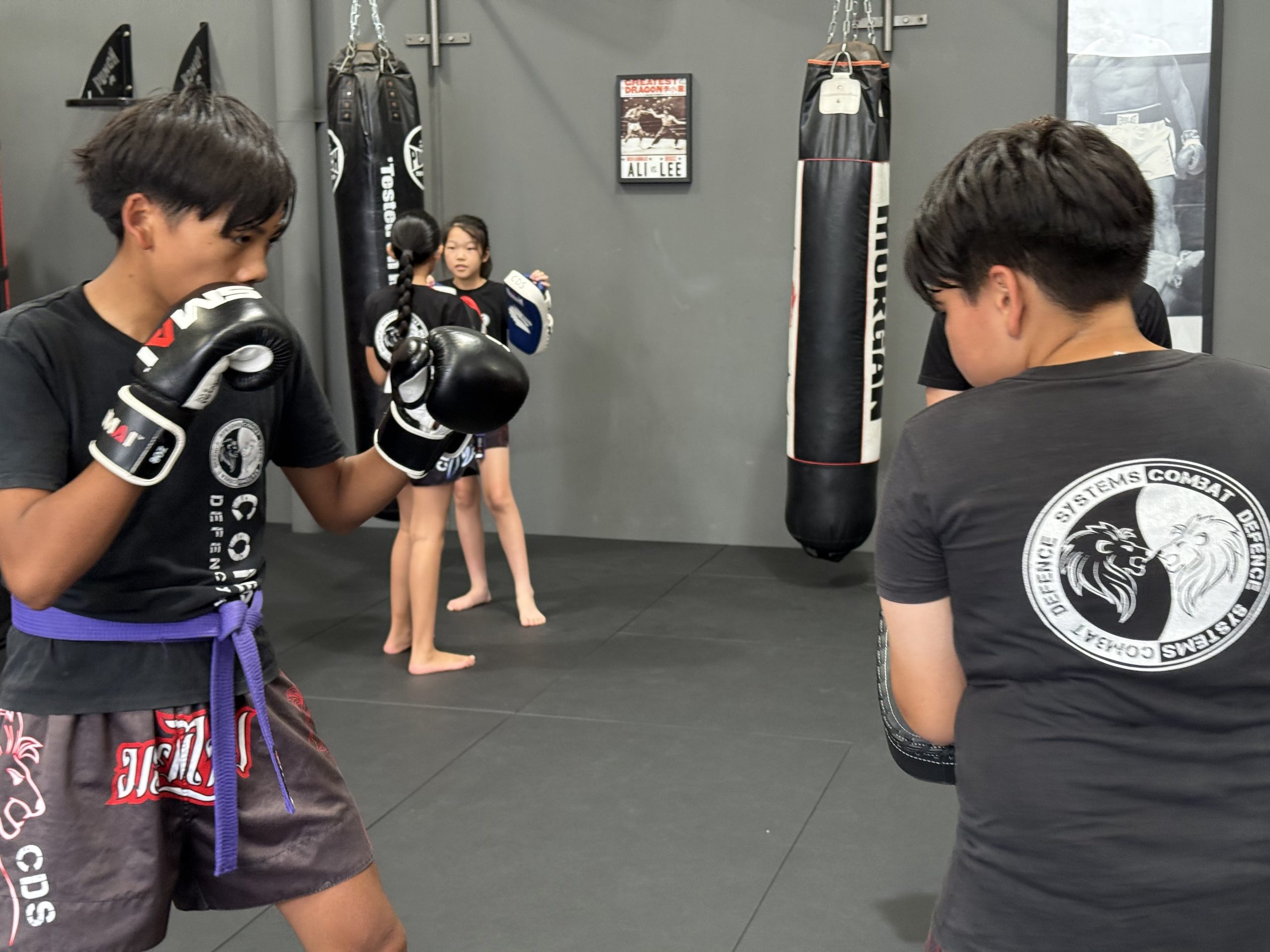 Young children in a martial arts class at Combat Defence Systems